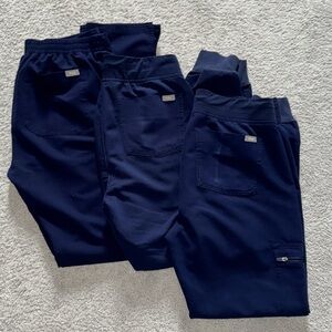 Figs navy blue jacket, top, and 3 pairs of pants!